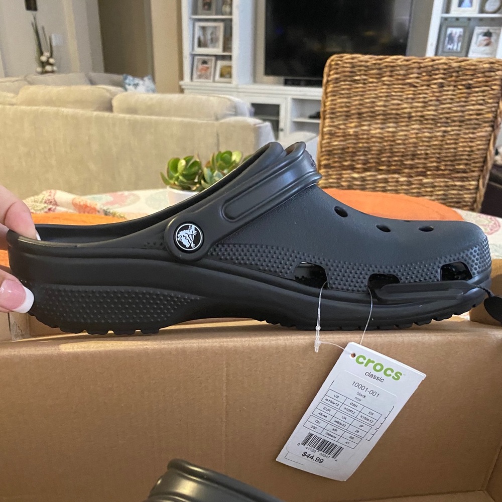 Men’s Crocs - Size 10, Women’s size 12